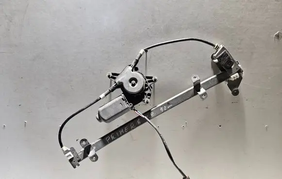 Nissan Primera Front door window regulator with motor 26031A 400135