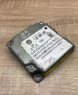 Volkswagen PASSAT B5 Airbag control unit/module 1J0909607 5WK4199