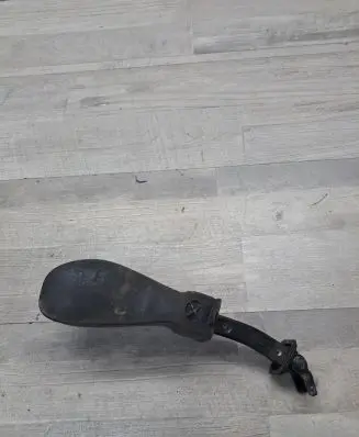 Front door check strap stopper