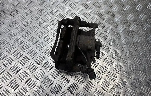 Volkswagen Golf VII Front brake caliper