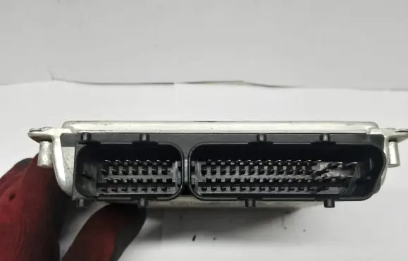 Volkswagen PASSAT B7 Engine control unit/module 8D0907558B