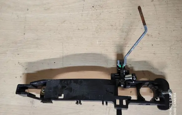Rear door exterior handle/bracket