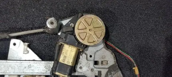 Mazda 323 Front door window regulator motor 