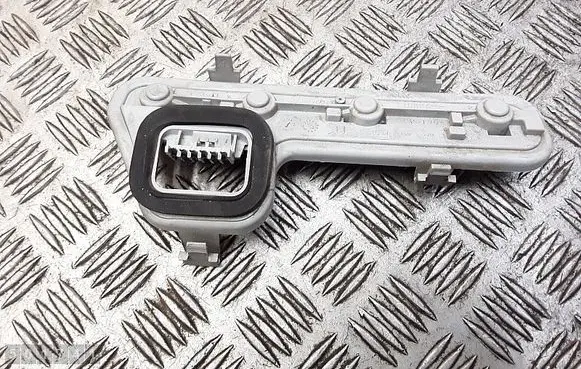 Tail light bulb cover holder