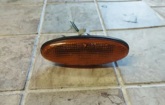 Mazda 626 Front fender indicator light 0464120