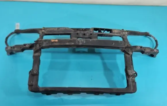 Radiator support slam panel