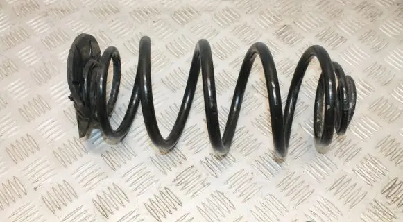 Opel Astra J Rear coil spring 13333951