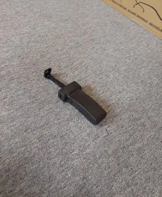 Front door check strap stopper