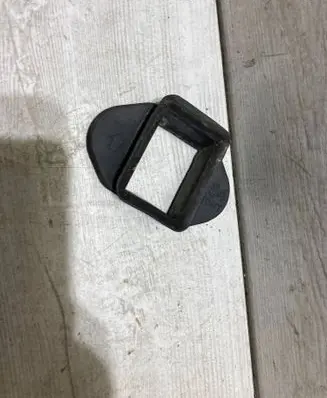 Front door check strap stopper