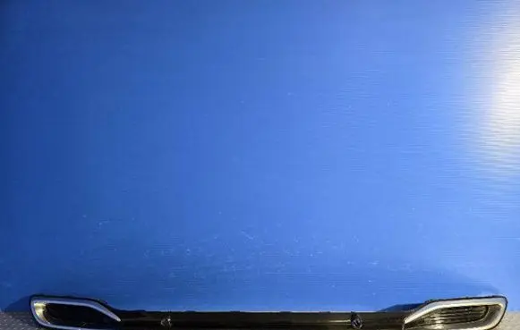Rear bumper trim bar molding