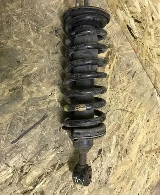 Nissan Navara D40 Front shock absorber with coil spring