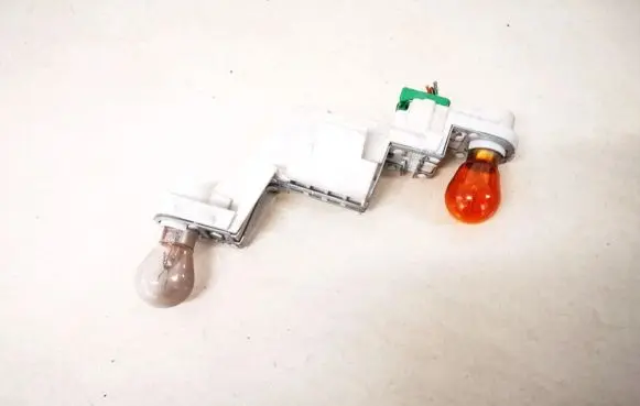Volvo V50 Tail light bulb cover holder 28127002