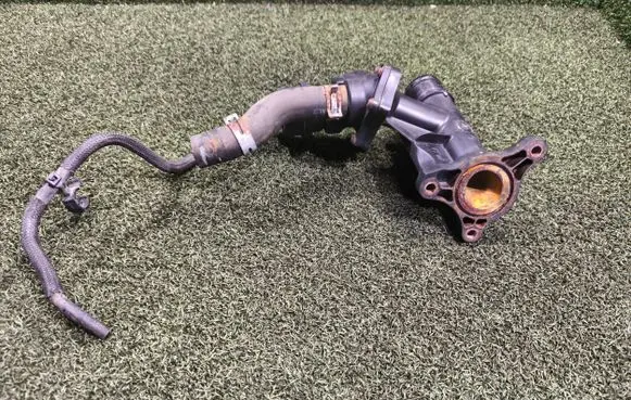 Thermostat/thermostat housing