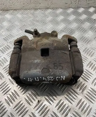 Nissan Juke I F15 Front brake caliper