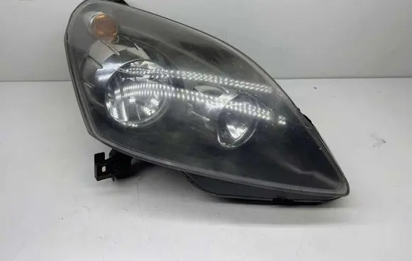 Opel Zafira B Headlight/headlamp 93190409 06281910