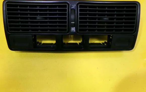 Volkswagen Golf IV Dash center air vent grill 1J0819734C