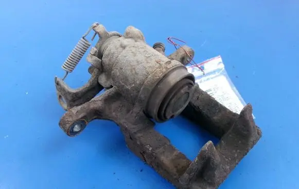 Opel Astra J Rear brake caliper