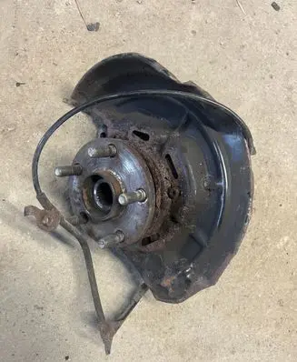 Front wheel hub spindle knuckle