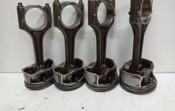 Piston with connecting rod