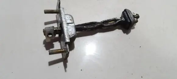 Mazda 323 Front door check strap stopper 