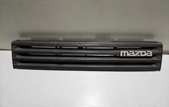 Mazda 323 Front grill B09250711 B09750711