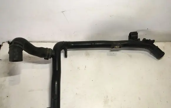 Skoda Superb B6 (3T) Engine coolant pipe/hose 03L121065AJ
