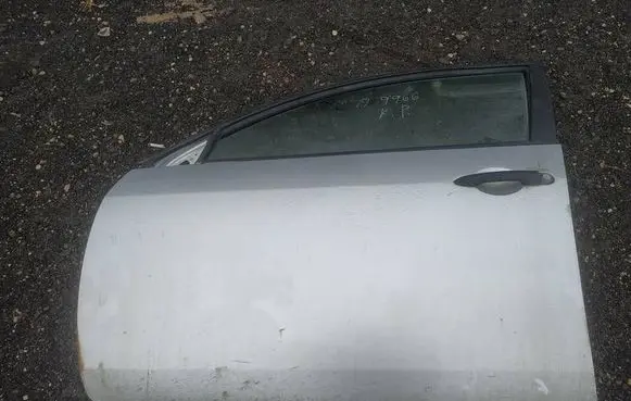 Nissan Primera Front door PILKOS