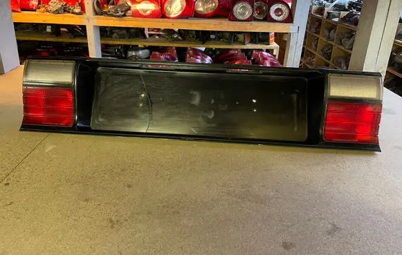Mitsubishi Galant Trunk door license plate light bar MB567150 567150
