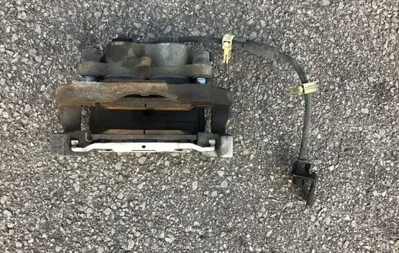Dodge Durango Front brake caliper OEM