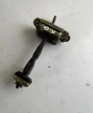 Mitsubishi Carisma Rear door check strap stopper
