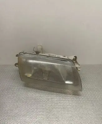 Mazda 323 Headlight/headlamp 205493B