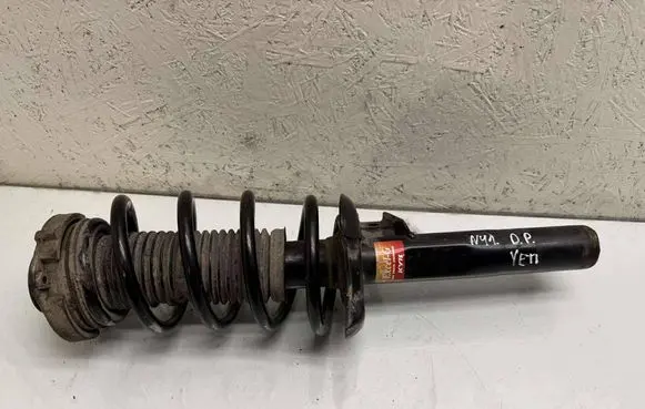 Front shock absorber with coil spring