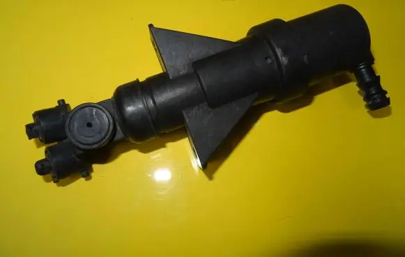 Headlight washer spray nozzle
