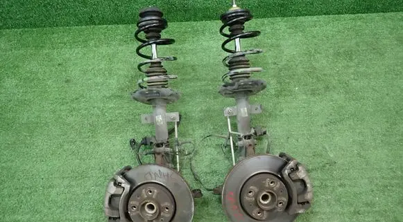 Front wheel hub spindle knuckle