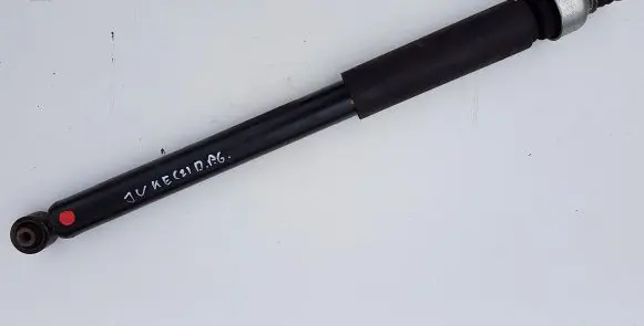Nissan Juke I F15 Rear shock absorber/damper 562101KA1B 8401