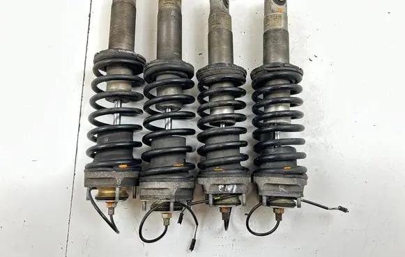 Maserati Coupe Set of springs and shock absorbers (Front and rear) 814904656717 814904556718