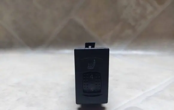 Seat heating switch