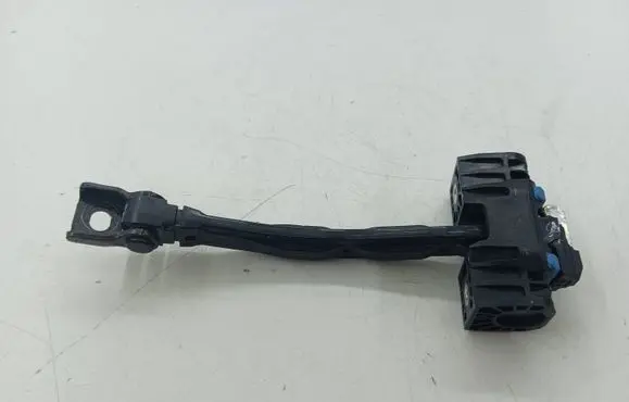 Front door check strap stopper