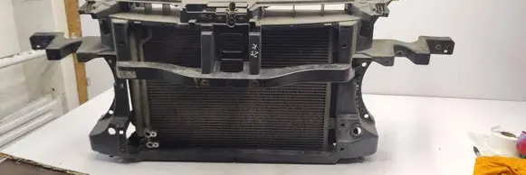 Radiator support slam panel