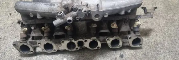 BMW 5 E34 Intake manifold 1284954 23035700
