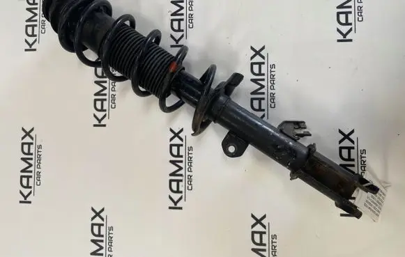 Nissan Note (E12) Front shock absorber with coil spring 543023VD0B