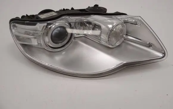 Volkswagen Touareg I Headlight/headlamp 7L6941032C 1ZS00945202 00945202241852