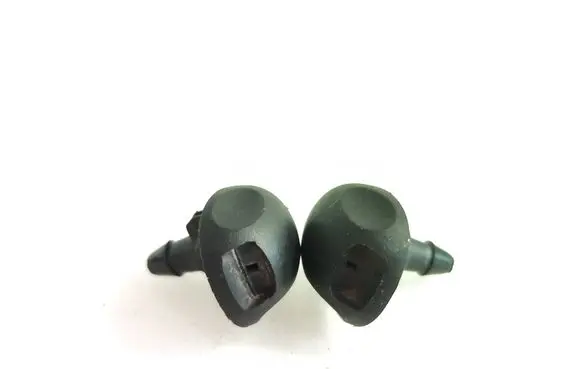Windshield washer spray nozzle