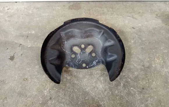 Opel Corsa F Rear brake disc plate dust cover 9825073280