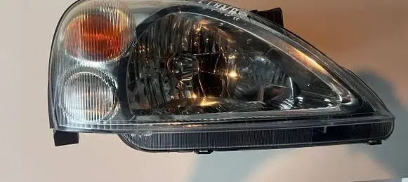 Suzuki Liana Headlight/headlamp 10032662