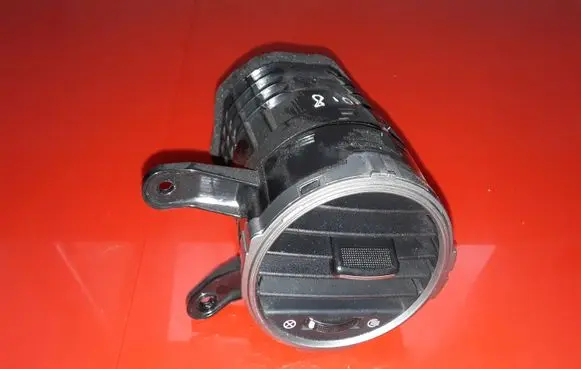 KIA Carens II Dash center air vent grill 974401D000 80462148