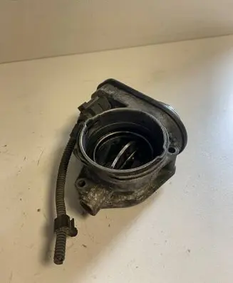 Volkswagen Touran I Throttle valve 038128063G