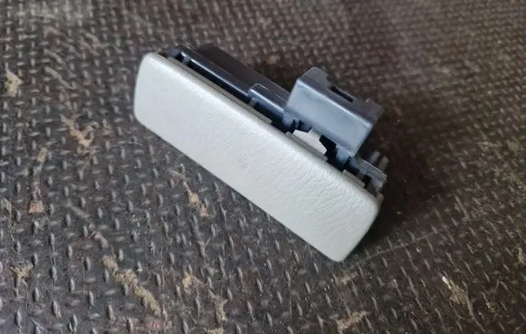 Nissan Patrol Y61 Glove box opening button 