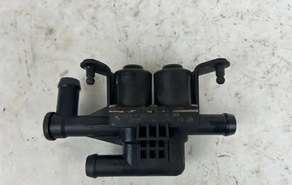Coolant heater control valve