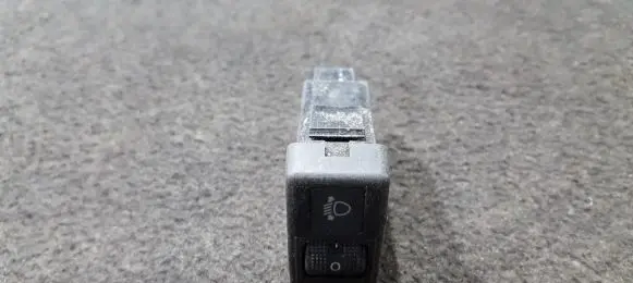 Headlight level height control switch